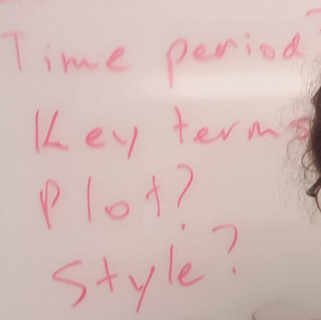 A photo of a whiteboard with keywords for close reading